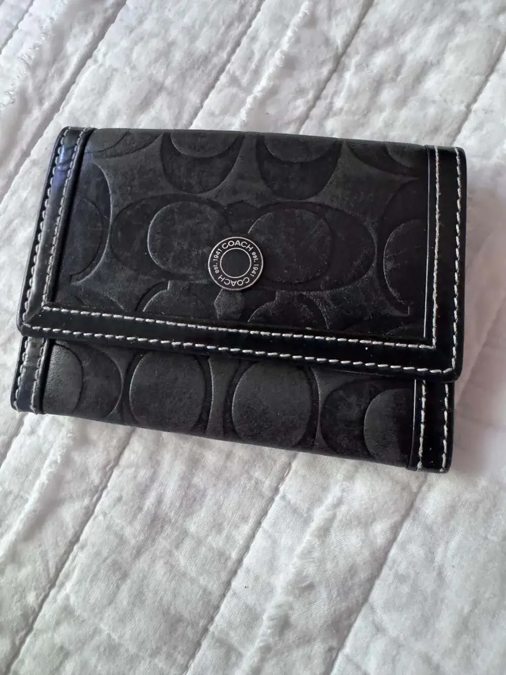 Coach Signature Embossed Leather Trifold Wallet
